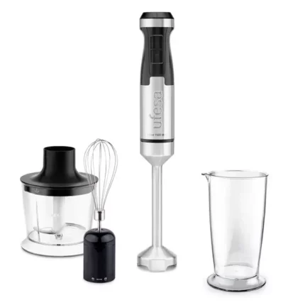 Immersion blender with whisk, chopping bowl, and tall measuring beaker on a white background.
