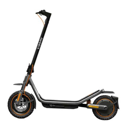 Side view of a black Xiaomi electric scooter with orange accents and large tires on white background.