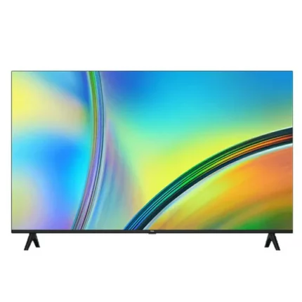Flat-screen television on two angled legs displaying a vibrant, abstract rainbow wallpaper against a white background.